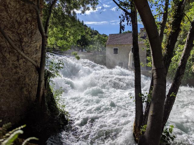 Waterfall between the houses