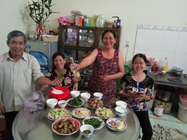 Host family presenting the dinner (and the empty bottle)