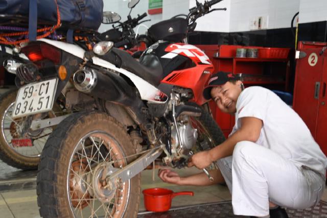 Mechanic performing the oil change