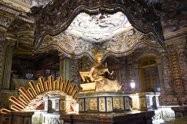 Tomb with bronze statue